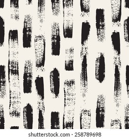 Vector seamless pattern. Abstract background with black brush strokes. Monochrome hand drawn texture. Modern graphic design.