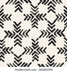 Vector seamless pattern. Abstract background with brush strokes. Monochrome hand drawn texture with chevron. Hipster trendy graphic design. 