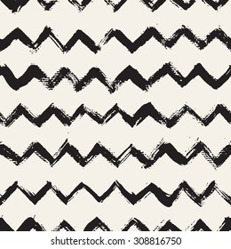 Vector seamless pattern. Abstract background with zigzag brush strokes. Monochrome hand drawn texture.