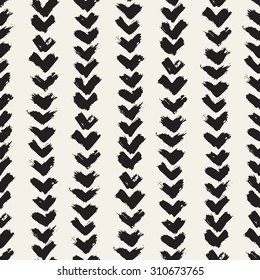 Vector seamless pattern. Abstract background with brush strokes. Monochrome hand drawn texture with chevron. Hipster trendy design.