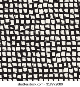 Vector seamless pattern. Abstract background with squares. Cute pattern from brush strokes. Monochrome hand drawn texture. Artistic tileable hipster print.