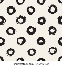 Vector seamless pattern. Abstract background with round brush strokes. Monochrome hand drawn texture. Stylish design with hipster symbols of hugs.