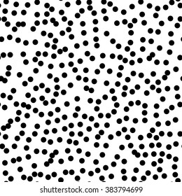 Vector seamless pattern. Abstract background with circles. Black and white polka dot ornament