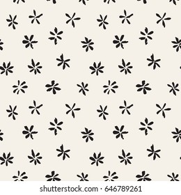 Vector seamless pattern. Abstract background with flowers made with brush strokes. Monochrome hand drawn texture. Artistic tileable theme with flowers.