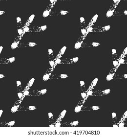 Vector seamless pattern. Abstract black brush strokes hand drawn with dry ink. Monochrome hand drawn seamless pattern. Modern graphic design.