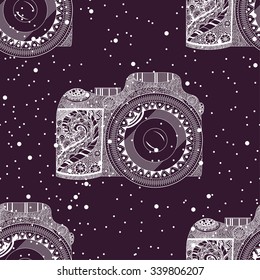 Vector seamless pattern with abstract circles and detailed camera in retro style isolated on a purple background. Vector illustration