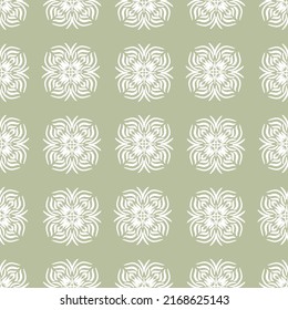 Vector seamless pattern with abstract floral shapes on a green background. Print for fabric, clothing, notebooks, scrapbooking, wrapping paper