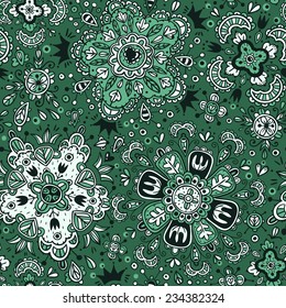 vector seamless pattern with abstract floral elements on a green background