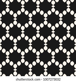 Vector seamless pattern. Abstract graphic monochrome background with small rounded shapes in smooth hexagonal grid. Black and white design. Texture of mesh, lace, lattice, weaving, net. Repeat tiles