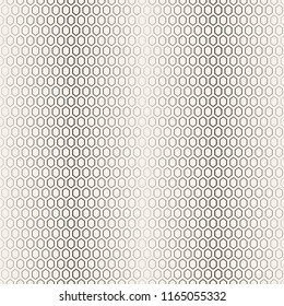 Vector seamless pattern. Abstract halftone background. Modern stylish texture. Repeating hexagonal grid with hexagons with decreasing contour thickness. Gradation from bigger to smaller.