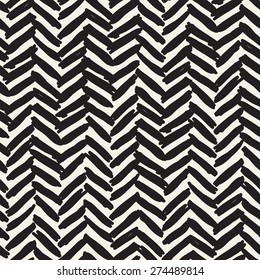 Vector seamless pattern. Abstract hand drawn background. Monochrome texture with herringbone. Modern graphic design. Creative hipster doodles with chevrons.