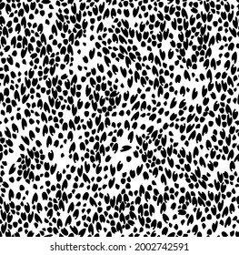 vector seamless pattern of abstract hearts, petals or leopard print. irregular distribution, vintage design