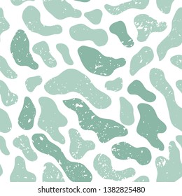 Vector seamless pattern. Abstract, modern print in green with scuffs. Spots on white background