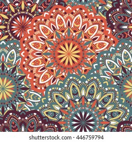 Vector seamless pattern with abstract ornament. Round mandala pattern for printing on fabric or paper. Ornamental doodle background.