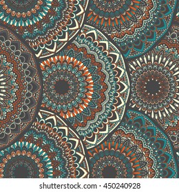 Vector seamless pattern with abstract ornament. Round mandala pattern for printing on fabric or paper. Ornamental doodle background.