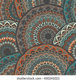 Vector seamless pattern with abstract ornament. Round mandala pattern for printing on fabric or paper. Ornamental doodle background.