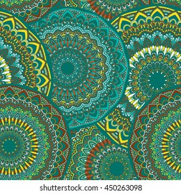 Vector seamless pattern with abstract ornament. Round mandala pattern for printing on fabric or paper. Ornamental doodle background.