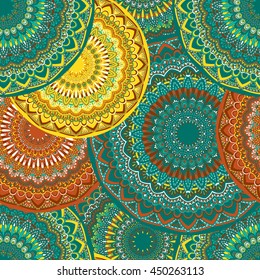 Vector seamless pattern with abstract ornament. Round mandala pattern for printing on fabric or paper. Ornamental doodle background.
