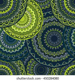 Vector seamless pattern with abstract ornament. Round mandala pattern for printing on fabric or paper. Ornamental doodle background.