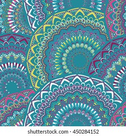 Vector seamless pattern with abstract ornament. Round mandala pattern for printing on fabric or paper. Ornamental doodle background.