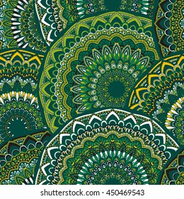 Vector seamless pattern with abstract ornament. Round mandala pattern for printing on fabric or paper. Ornamental doodle background.