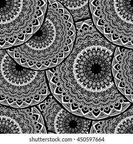 Vector seamless pattern with abstract ornament. Round mandala pattern for printing on fabric or paper. Ornamental doodle background.