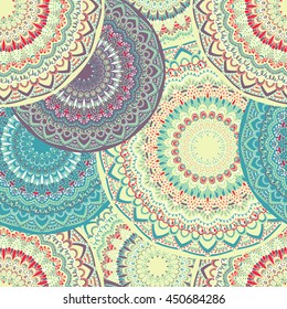 Vector seamless pattern with abstract ornament. Round mandala pattern for printing on fabric or paper. Ornamental doodle background.