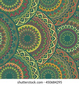 Vector seamless pattern with abstract ornament. Round mandala pattern for printing on fabric or paper. Ornamental doodle background.