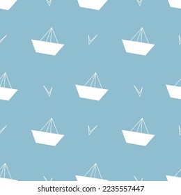 Vector seamless pattern with abstract paper boats on blue background. Modern design for fabric and paper, surface textures.