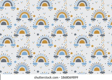 Vector seamless pattern of abstract rainbows with clouds, raindrops and stars in yellow and gentle blue colors on a light gray background. Cute baby endless texture in Scandinavian style.