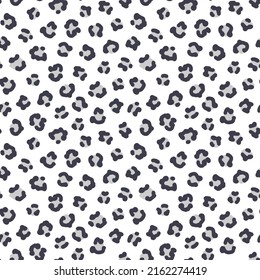 Vector seamless pattern with abstract spots. Animal print. Hand drawn illustration. The print is used for Wallpaper, fabric, textile.