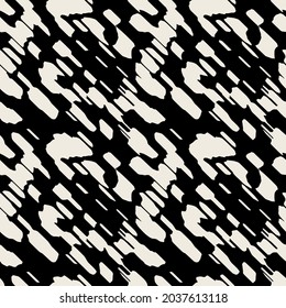 Vector seamless pattern. Abstract spotty texture. Natural monochrome design. Creative background with diagonal blots. Decorative organic swatch.