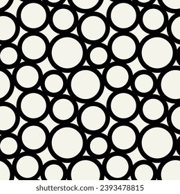 Vector seamless pattern. Abstract spotty texture. Natural monochrome design. Creative background with rounded spots. Decorative organic swatch.