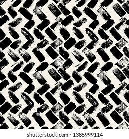 Vector seamless pattern. Abstract textured background with zigzag brush strokes. Monochrome hand drawn print with chevron design.