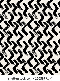 Vector seamless pattern. Abstract textured background with zigzag brush strokes. Monochrome hand drawn print with chevron design.
