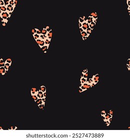 Vector seamless pattern with animal print. Leopard print. A heart with a leopard print in the middle of warm colors on a dark background.