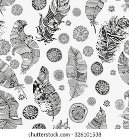 Vector seamless pattern of  artistically feathers and mandalas on a white background. Vintage, tribal, artistically drawn, stylized, feathers, zentangle.  Made by trace from sketch.