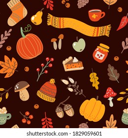 Vector seamless pattern with autumn cozy elements. Bright repeating texture for the fall season. Harvest time. Wrapping. Autumn background with leaves, pumpkins, mushrooms, jam, pie, a cup of tea.