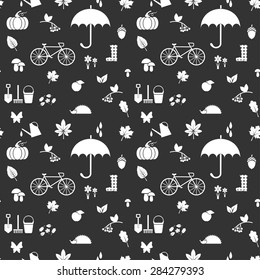 vector seamless pattern with autumn icons silhouettes on the dark background