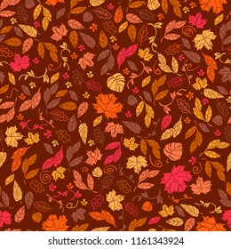 Vector seamless pattern of autumn leaves and flowers. Background for textile or book covers, wallpapers, design, graphic art, printing, hobby, invitation.