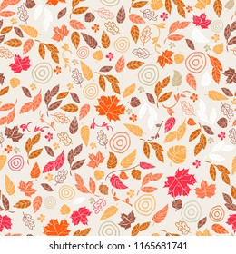 Vector seamless pattern of autumn leaves and flowers. Background for textile or book covers, wallpapers, design, graphic art, printing, hobby, invitation.