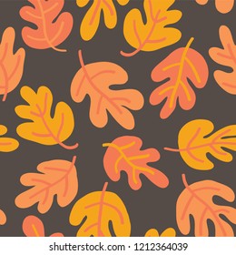 Vector seamless pattern of autumn leaves. Oak leaf subtle fall background orange, yellow, and brown for textile, digital paper, wallpaper, web banner, invitation, Thanksgiving season, page fill, card