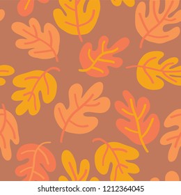 Vector seamless pattern of autumn leaves. Oak leaf subtle fall background orange, yellow, and red for textile, digital paper, wallpaper, web banner, invitation, Thanksgiving season, page fill, card