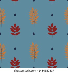 Vector seamless pattern with autumn leaves on a blue background.