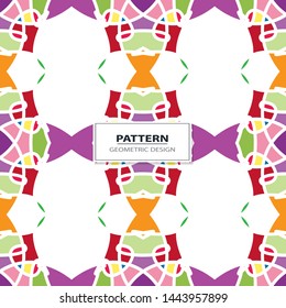 Vector seamless pattern background with different geometrical shapes of multiple colors. Illustration with symmetrical design. Kaleidoscope backdrop. Modern banner design template.