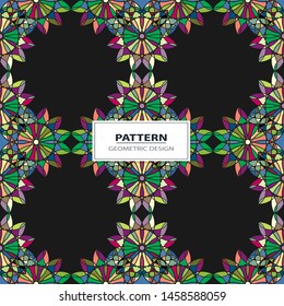 Vector seamless pattern background with different geometrical shapes of multiple colors.
