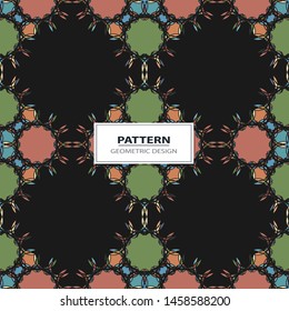 Vector seamless pattern background with different geometrical shapes of multiple colors.