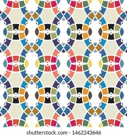 Vector seamless pattern background with different geometrical shapes of multiple colors. Illustration with symmetrical design.