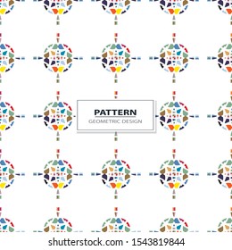 Vector seamless pattern background with different geometrical shapes of multiple colors. Illustration with symmetrical design.