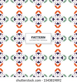 Vector seamless pattern background with different geometrical shapes of multiple colors. Illustration with symmetrical design.